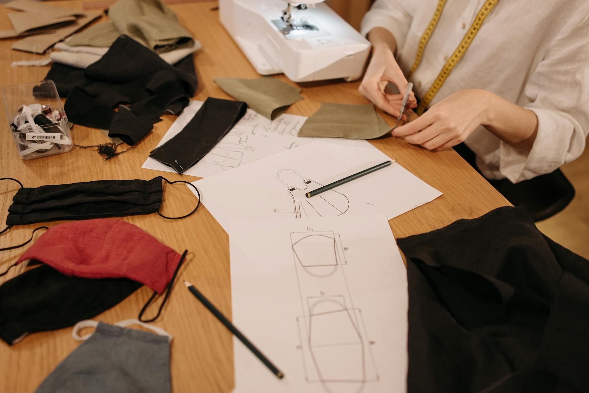 a person making cloth face masks