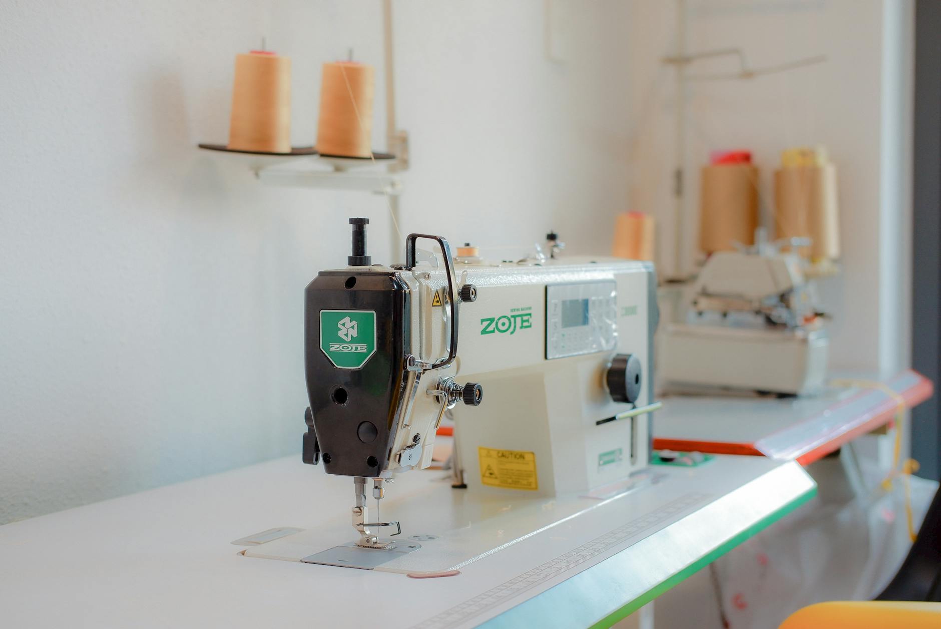 a sewing machine in a tailor workshop